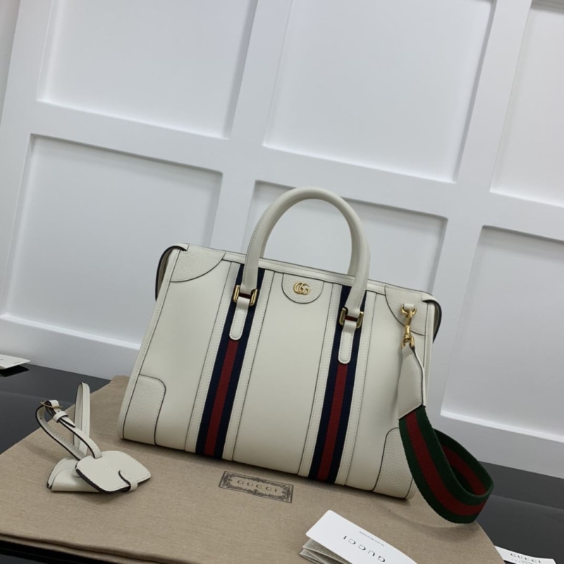 G*u*i shopping bags